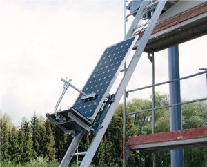 Ladder lift carrying solar panels